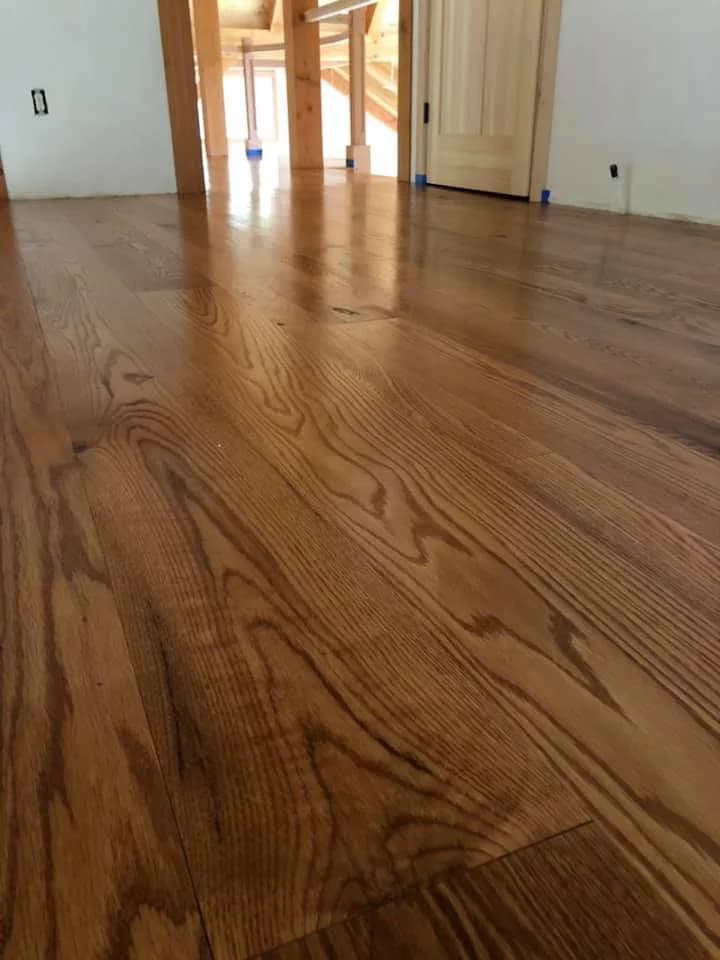 Wide plank, medium stain hardwood installation